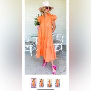 Absolutely gorgeous orange midi dress. Size Medium. Brand New -never worn.